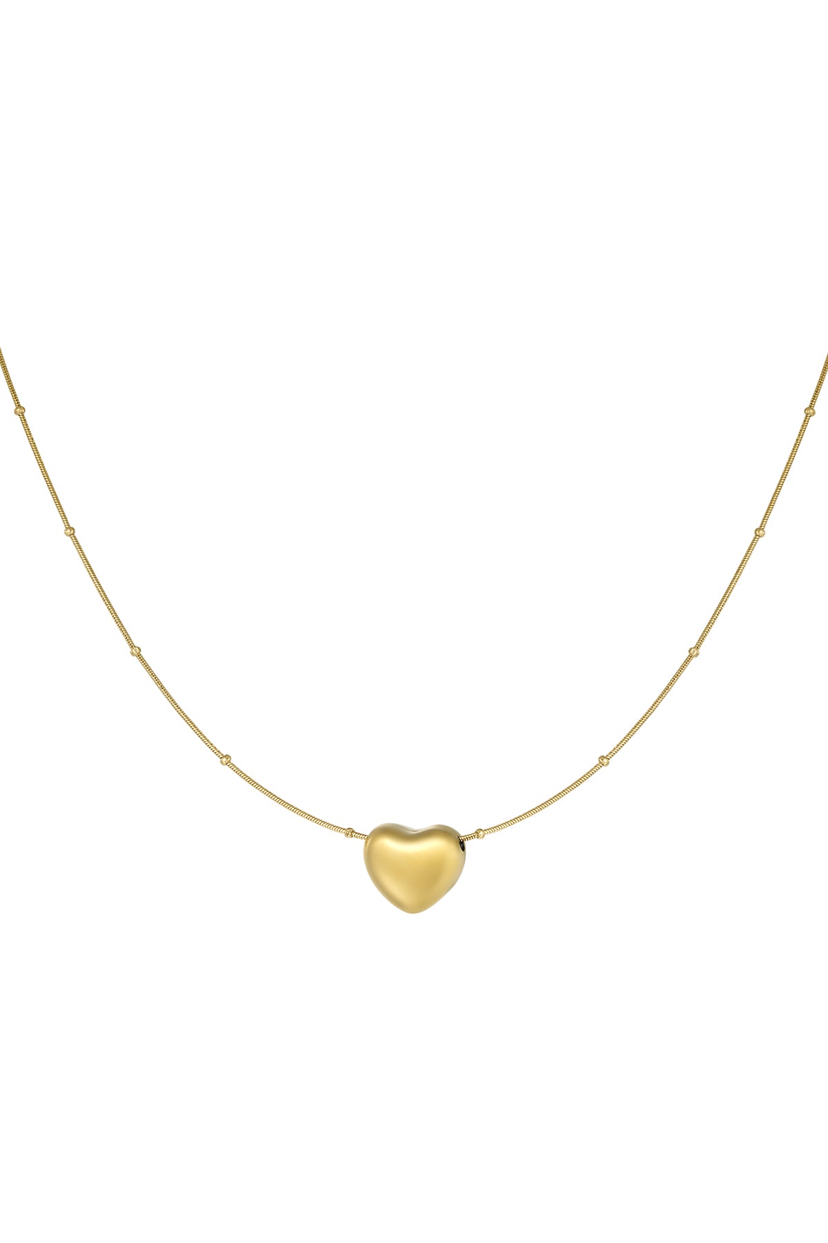 Close-up of a gold heart pendant necklace with a delicate chain featuring spaced beads on a white background
