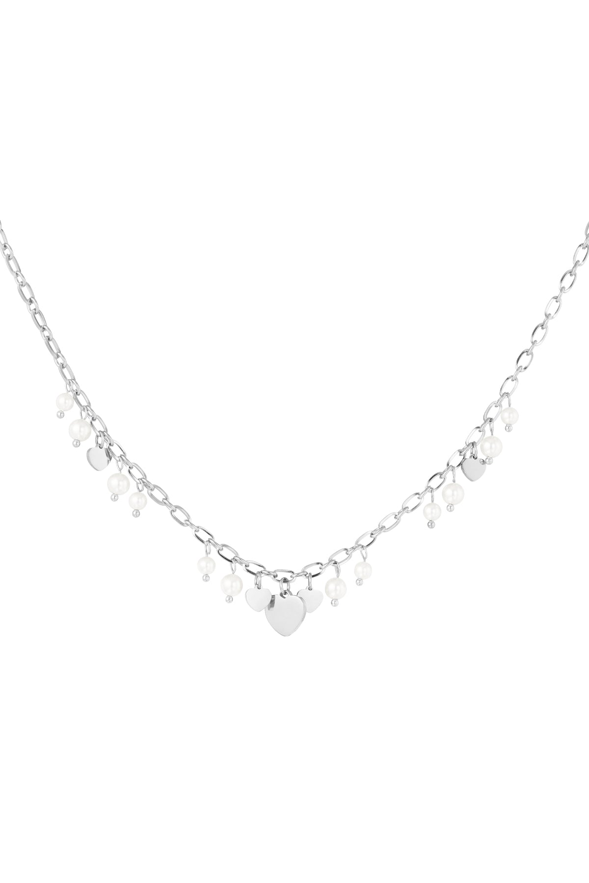 Silver chain necklace with dangling heart-shaped charms and white pearl beads against white background