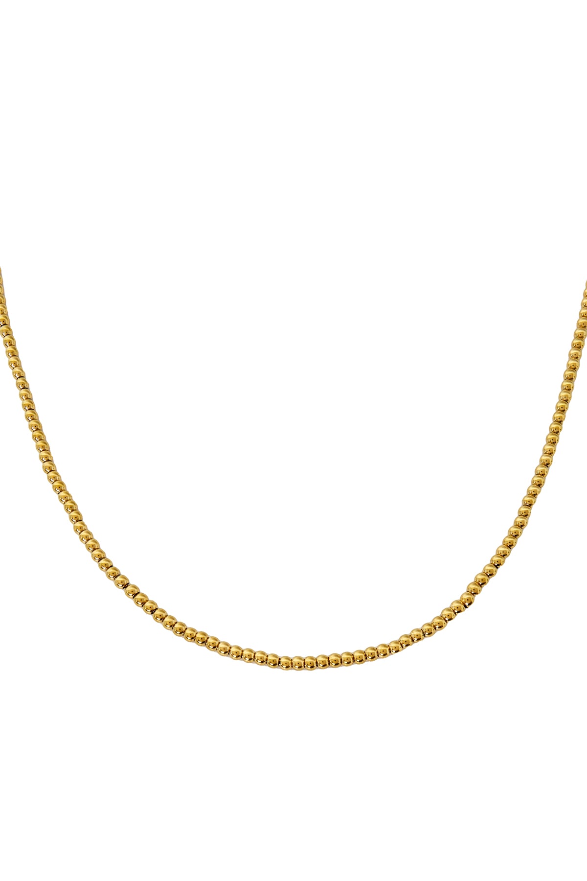 Close-up of gold-toned beaded necklace with small round beads laid out against white background