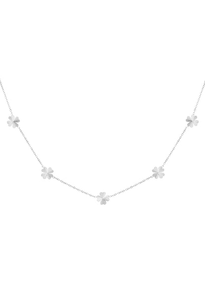 Silver tone four-leaf clover necklace shown on white background