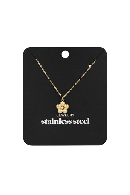 Gold flower pendant necklace displayed on black card reading 'stainless steel jewelry'