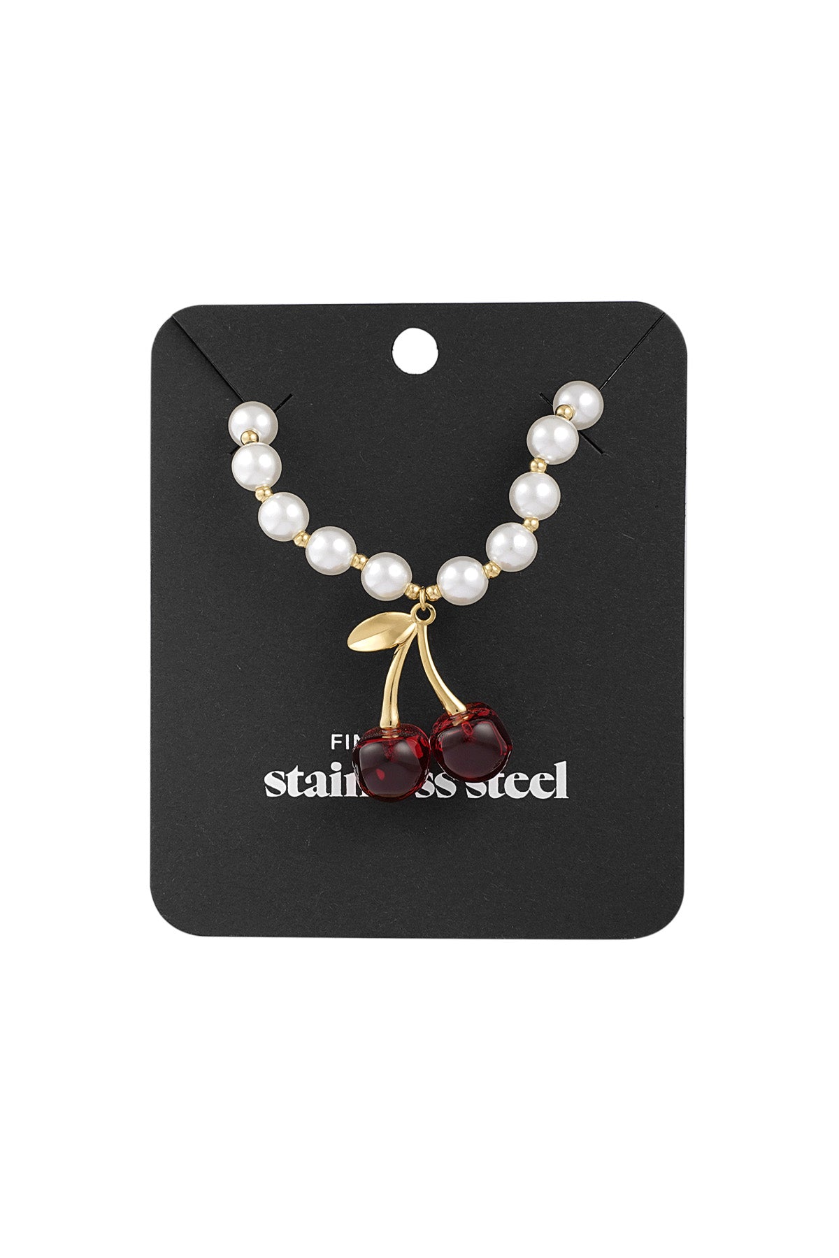 Pearl and cherry pendant necklace displayed on black branded card packaging