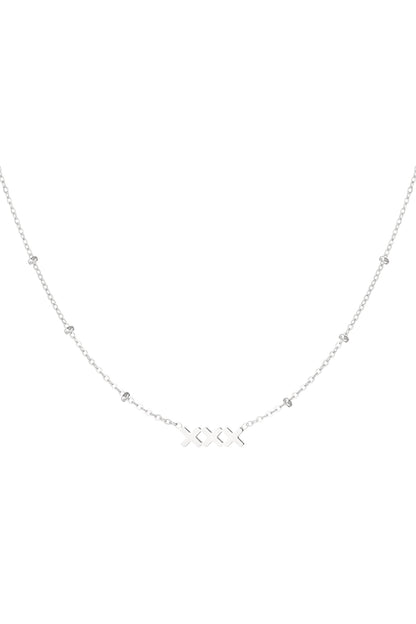 Silver minimalist necklace with XXX pendant and beaded accents on fine chain