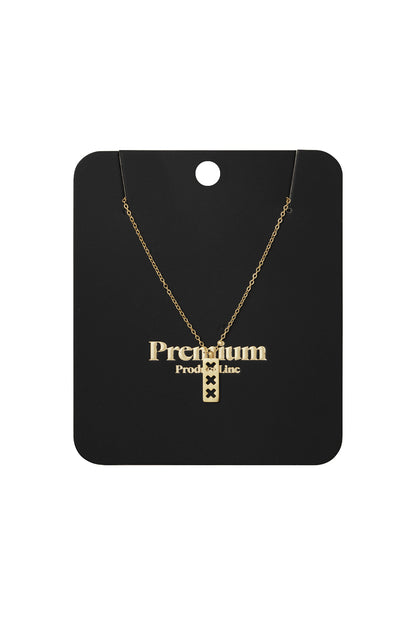 Gold triple X pendant necklace displayed on black Premium Product Line card packaging with chain arranged neatly.
