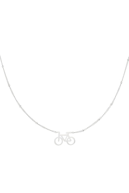 Silver cycle chic pendant necklace with delicate beaded chain on white background