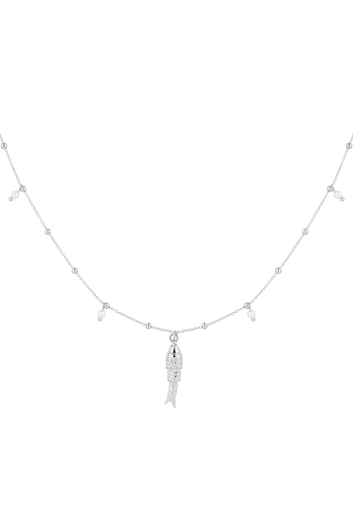 Close-up of delicate silver fish charm necklace with tiny pearl-like beads on a white background