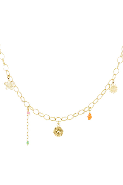 Gold chain necklace with flower charms and colourful beads on a white background