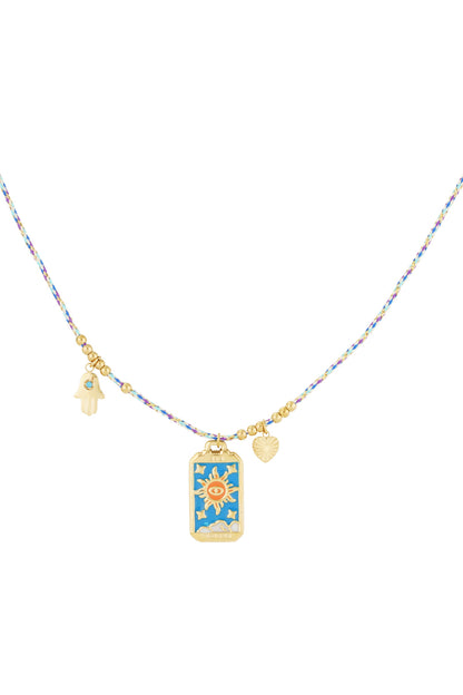 Braided necklace with gold sun charm on blue enamel, heart and Hamsa hand charms on braided multi-colour cord