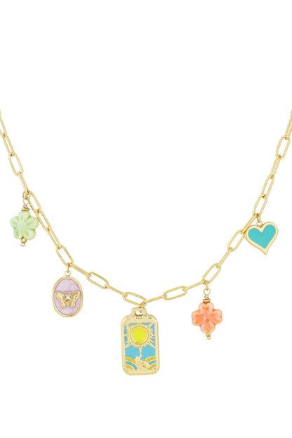 Gold-tone charm link necklace featuring colourful enamel charms including turquoise heart, pastel flowers, butterfly cameo, and sun motif on blue background