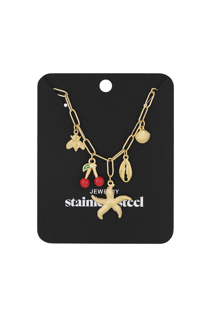 Gold charm necklace displayed on black card packaging with same beach pendants