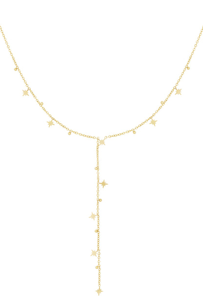 Gold Y-drop necklace featuring small star charms and tiny beads evenly spaced along a delicate chain