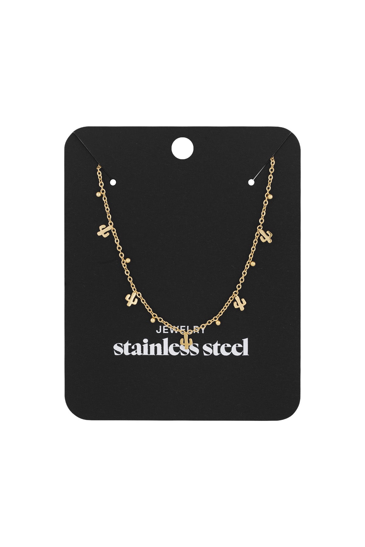 Gold cactus charm necklace displayed on black stainless steel branded card