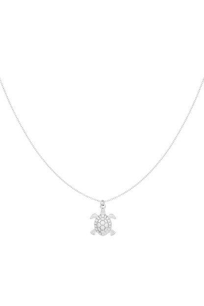Silver turtle charm pendant necklace on a delicate chain displayed on white background