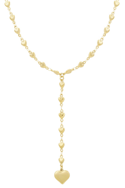 Gold heart chain necklace with dangling heart pendant on white background
