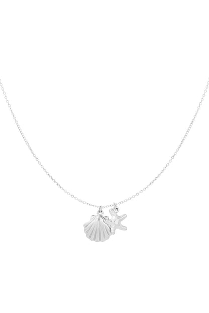 Silver pendant necklace featuring starfish and scallop shell charms on delicate chain, isolated on white background