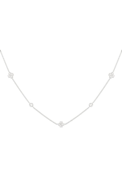 Silver-tone delicate chain necklace with four-leaf clover charms and rhinestones on a white background