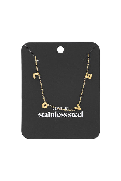 Gold LOVE necklace displayed on black packaging card labelled stainless steel