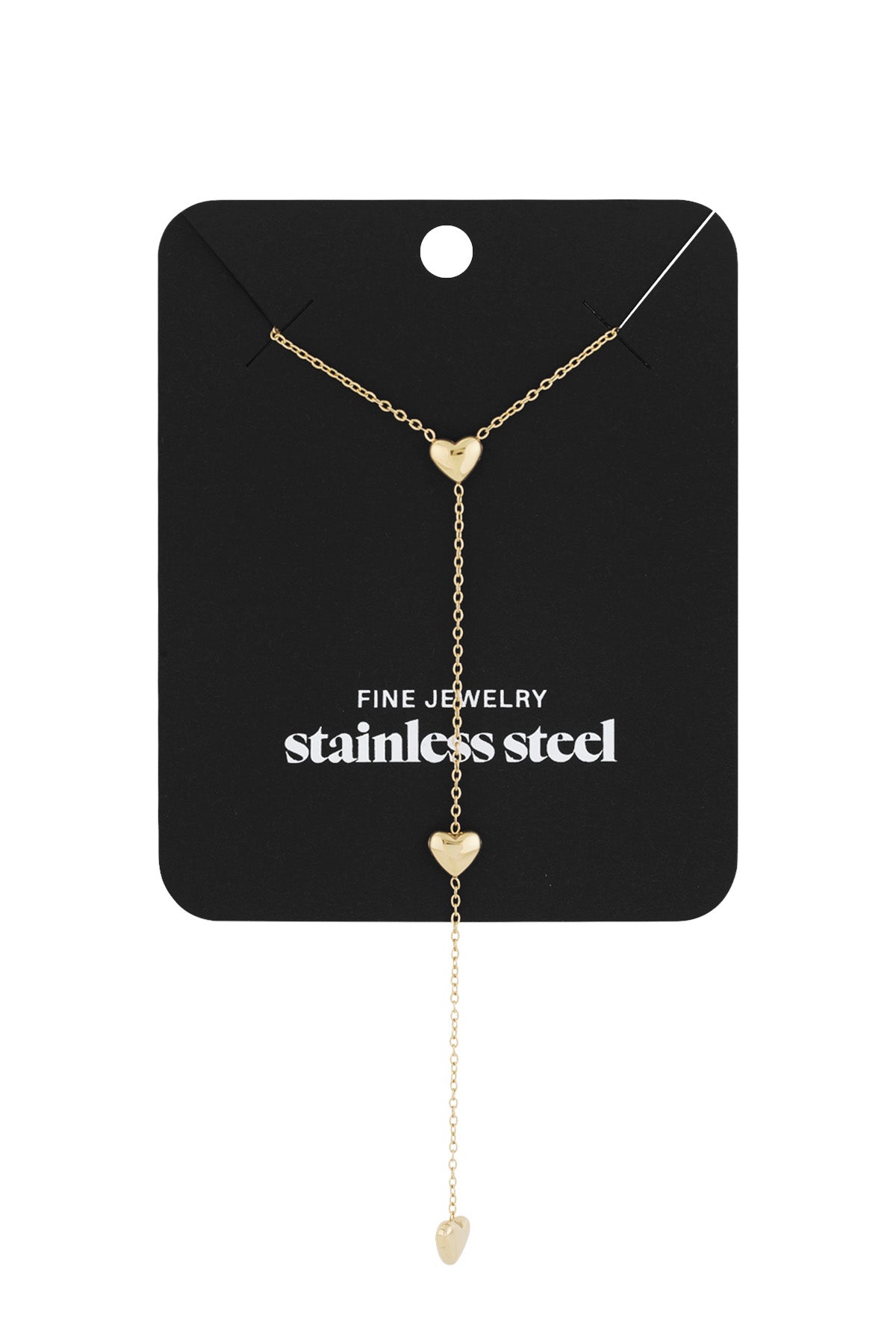 Gold heart drop necklace displayed on black card labelled stainless steel fine jewelry