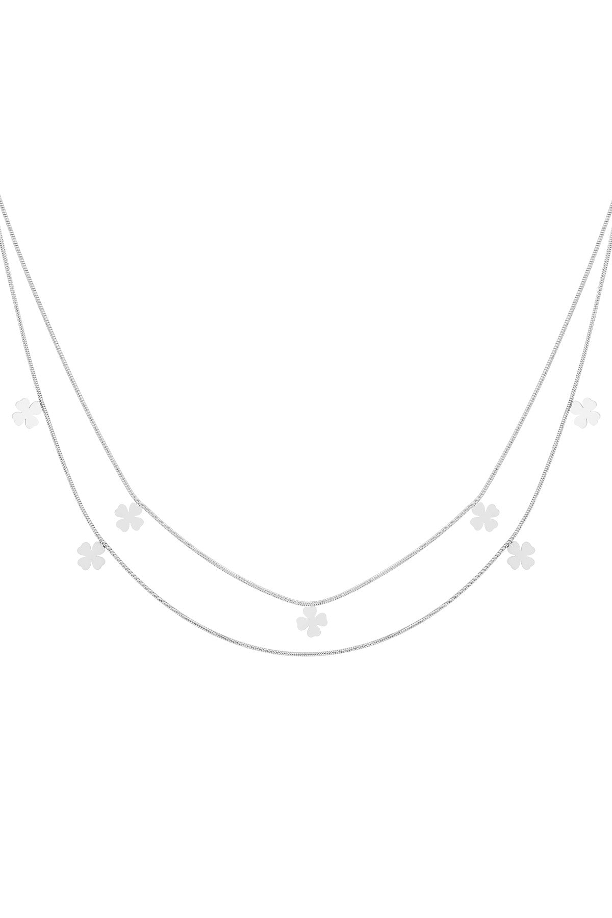Double-layer silver necklace featuring multiple small four-leaf clover charms on delicate chains laid flat