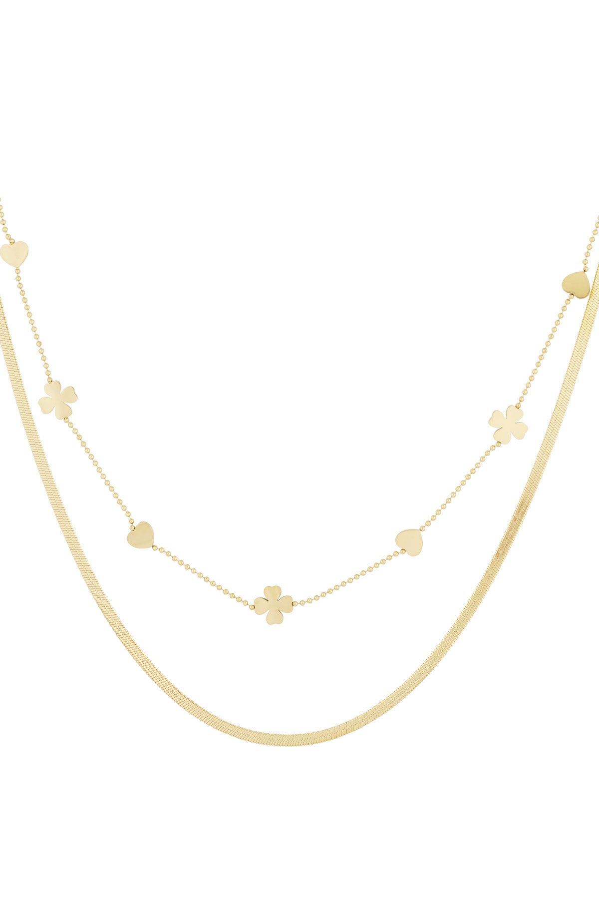 Close-up of gold double-layered necklace with heart and four-leaf clover charms on white background