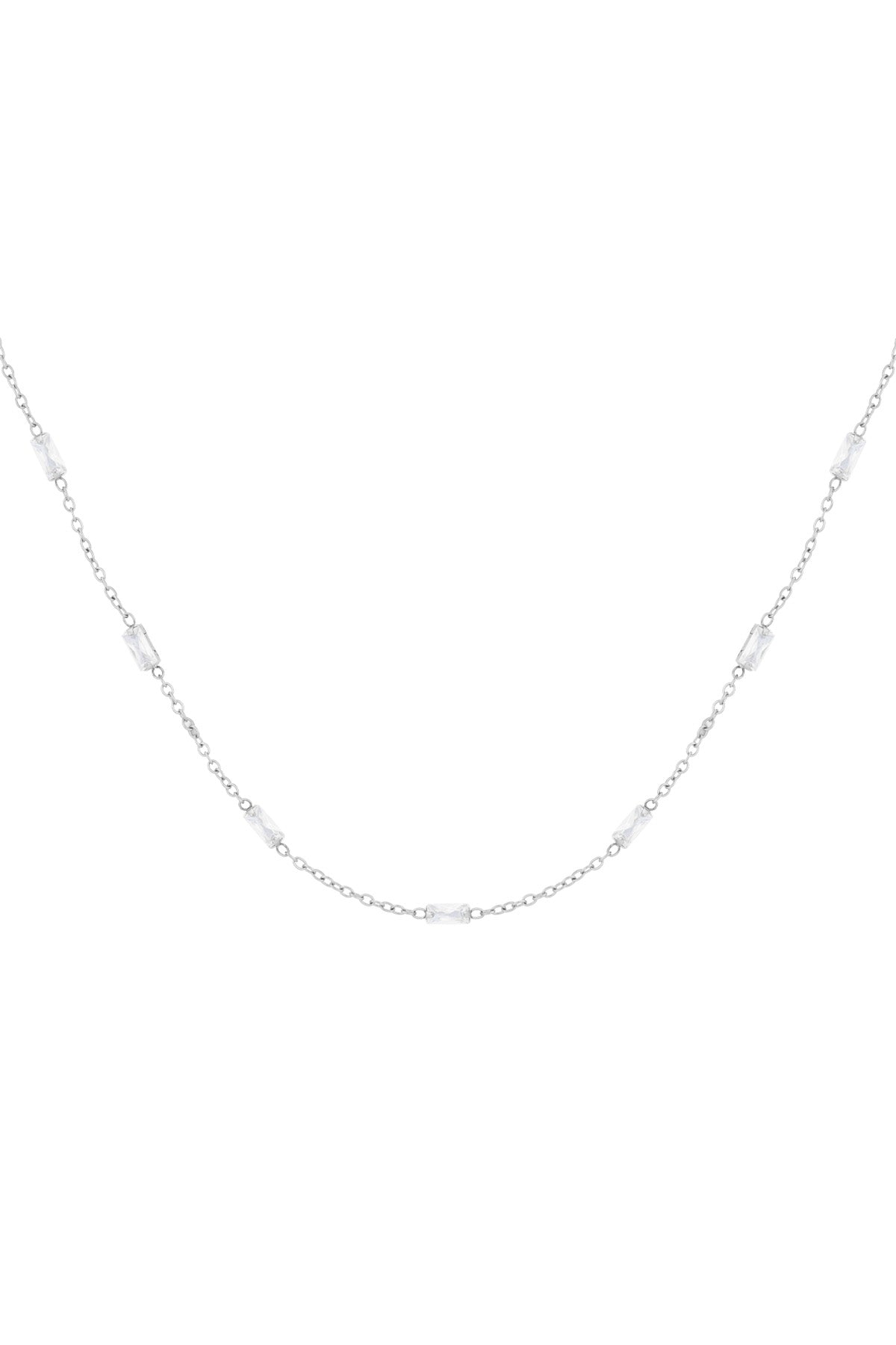 Silver tone delicate chain necklace with rectangular clear crystals spaced evenly along the chain on white background