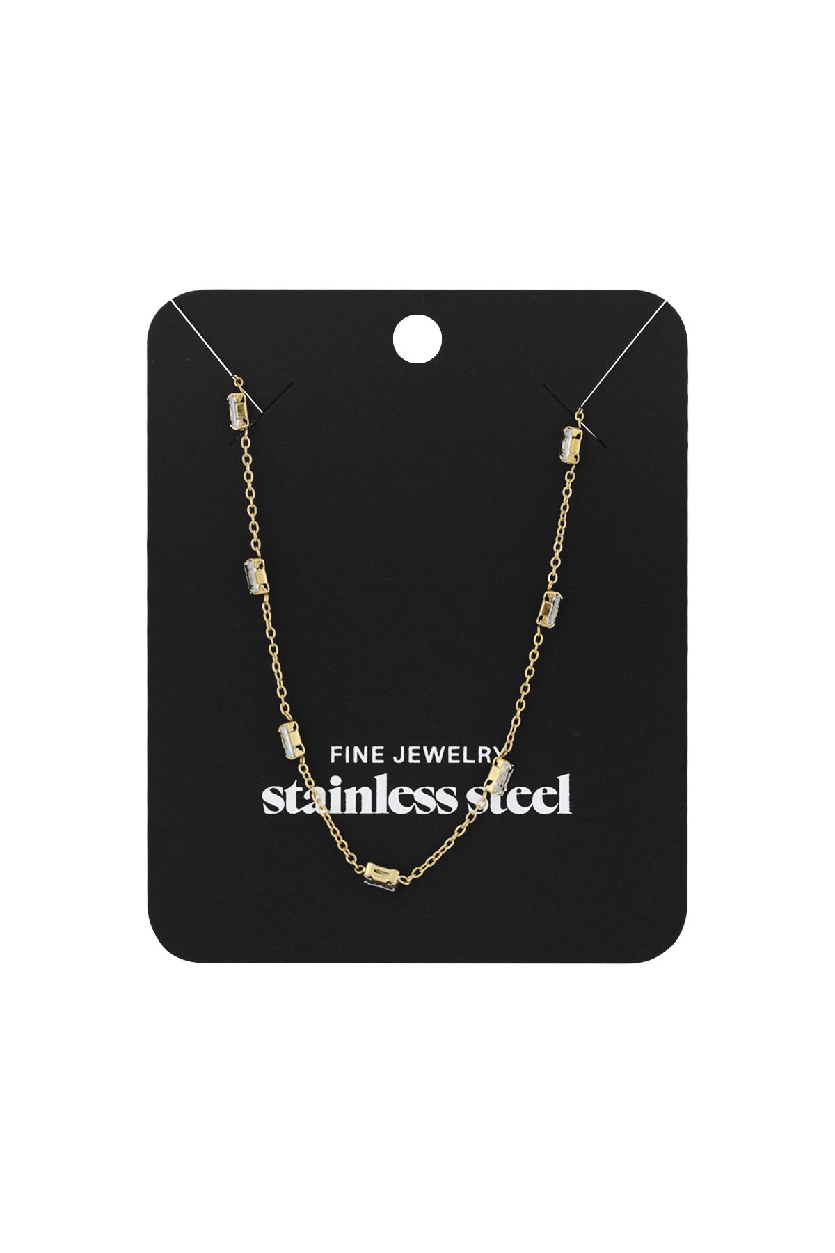 Gold crystal chain necklace displayed on black jewelry card labeled 'stainless steel fine jewelry' packaging