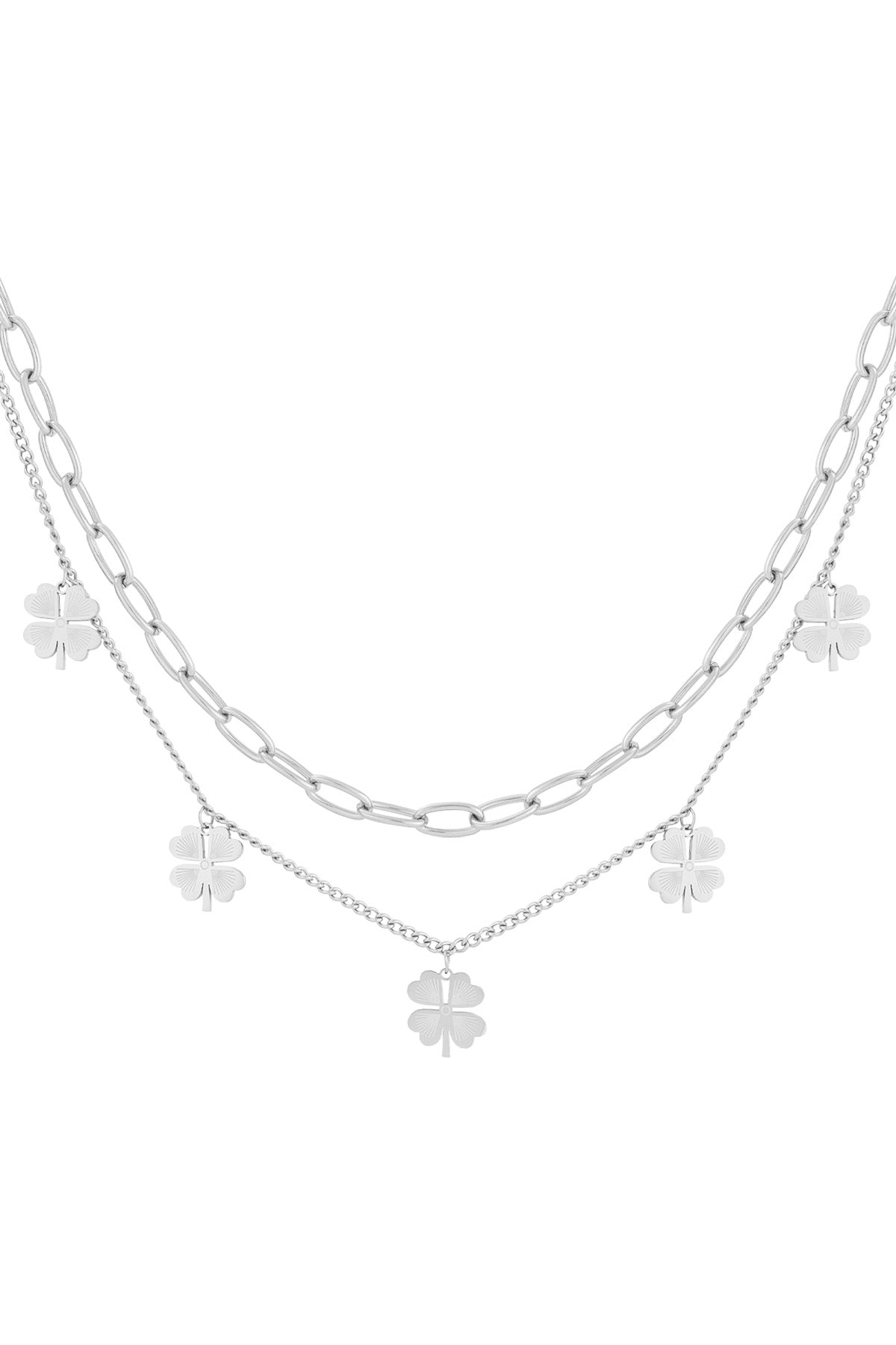 Silver layered necklace with clover charms shown against white background