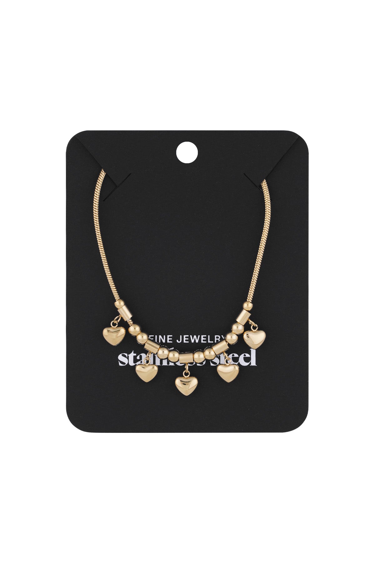 Gold heart charm necklace displayed on a black jewellery card highlighting the elegant charm and design