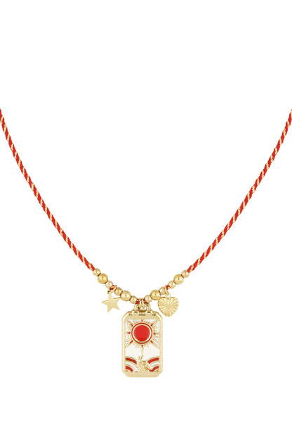 Solar charm necklace with red braided cord and gold-tone sun, hand, star, and heart charms on white background