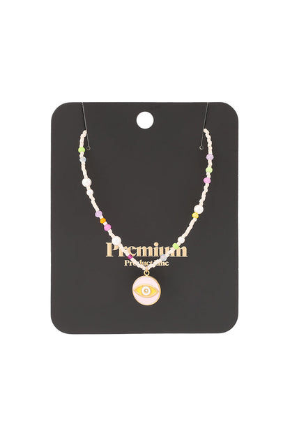 Beaded eye necklace displayed on black premium product card