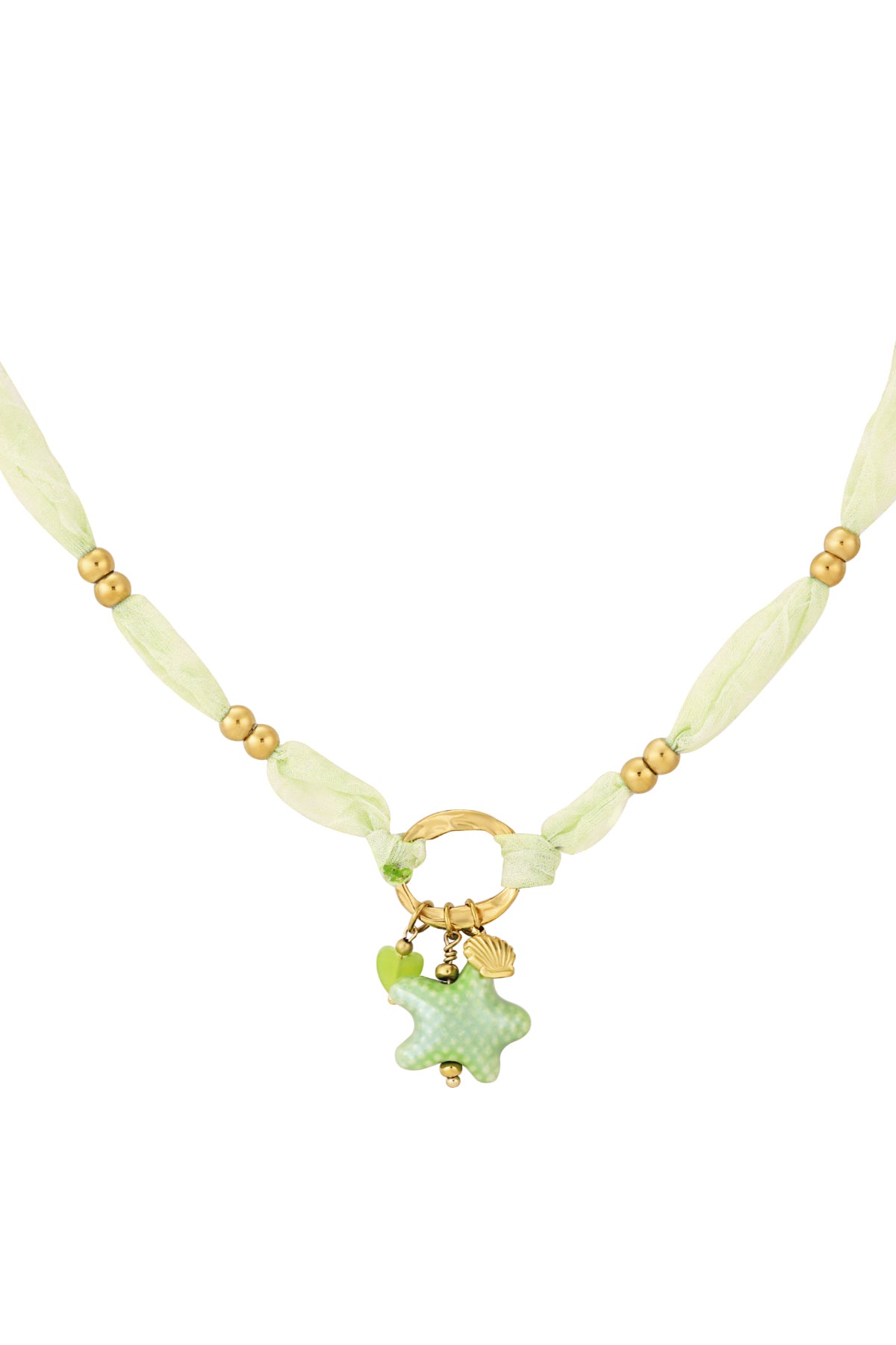 Close-up of soft green organza fabric necklace with matte gold beads and sea star charm with shell and heart pendants