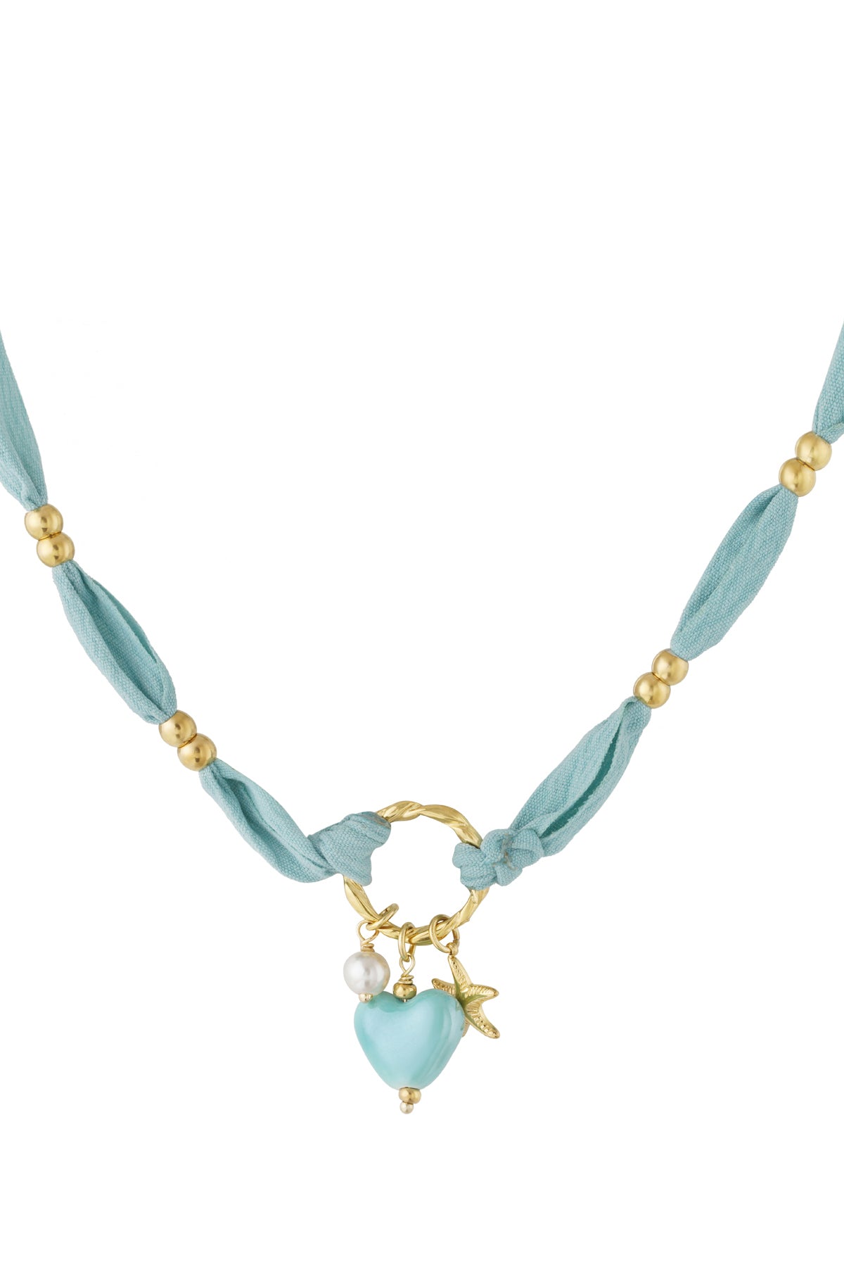 Close-up of playful braided heart charm necklace with light blue fabric, gold beads, and charms including a blue heart, starfish, and pearl.
