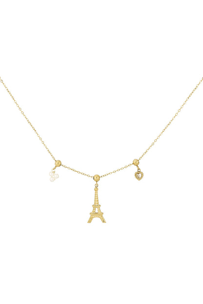 Gold chain necklace with Eiffel Tower, pearl cluster, and heart-shaped charms on white background