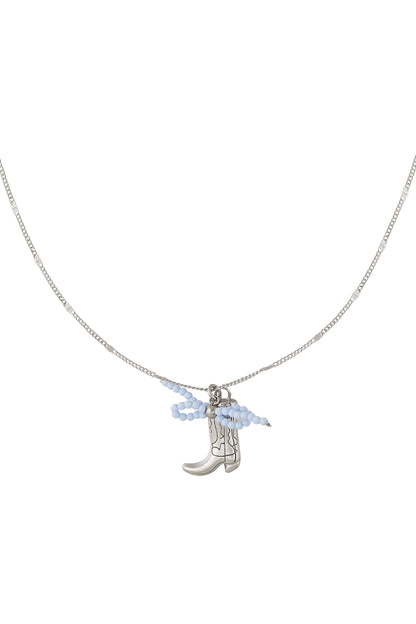 Silver-tone cowboy boot pendant necklace with pale blue beaded bow on delicate chain
