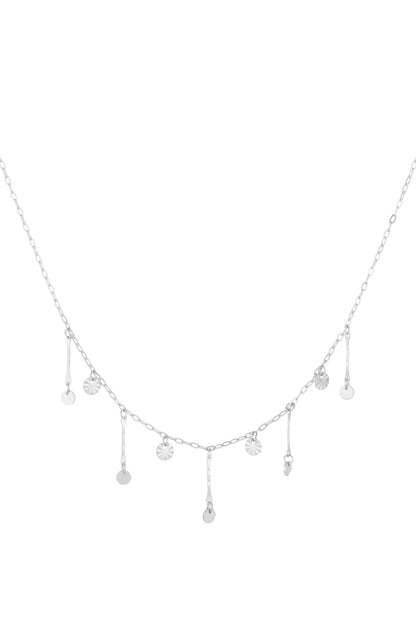 Silver version of the dainty disc charm necklace with alternating round and textured discs on chain