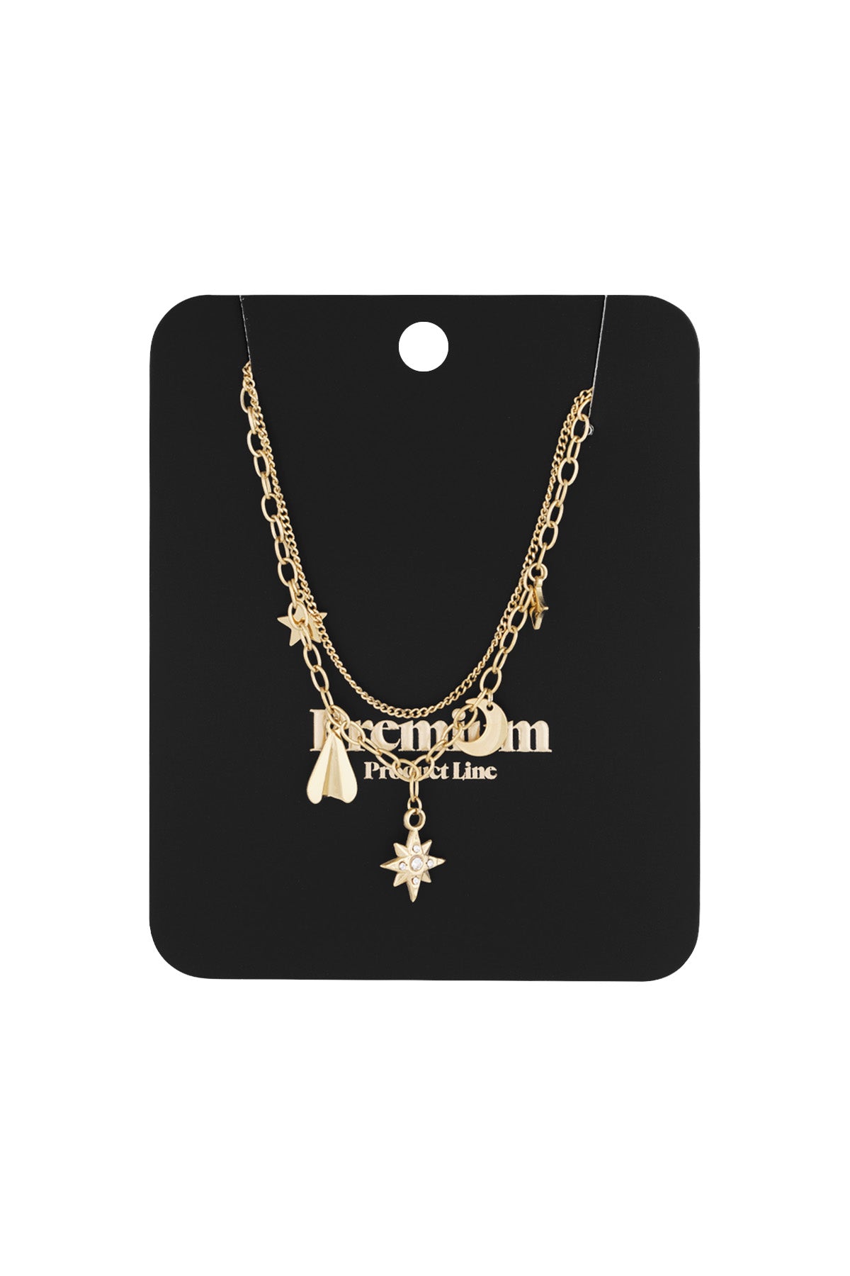 Gold layered celestial charm necklace displayed on a black jewelry card