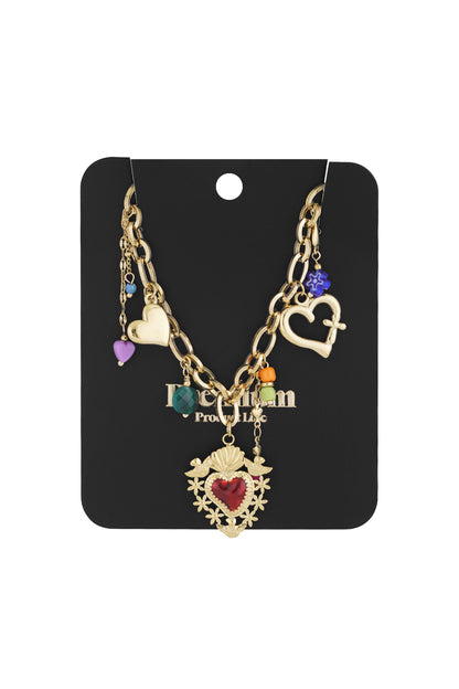Gold charm necklace displayed on a black jewellery card showcasing the mix of heart pendants and colourful beads