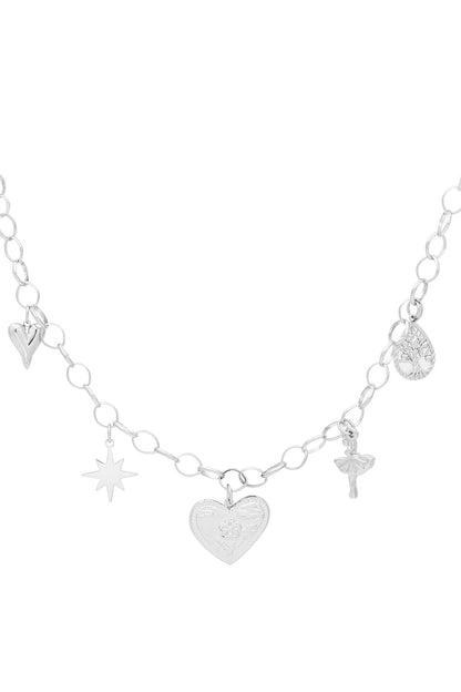 Silver-tone version of the charm necklace with heart, star, ballerina, tree, and embossed heart pendants on a white background