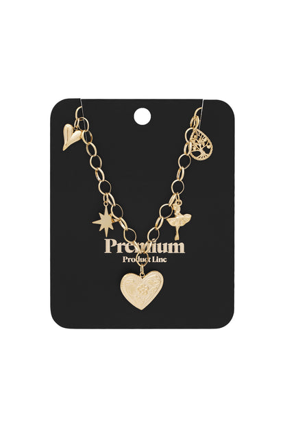 Gold-tone charm necklace displayed on black card packaging showing heart, star, ballerina, and tree pendants