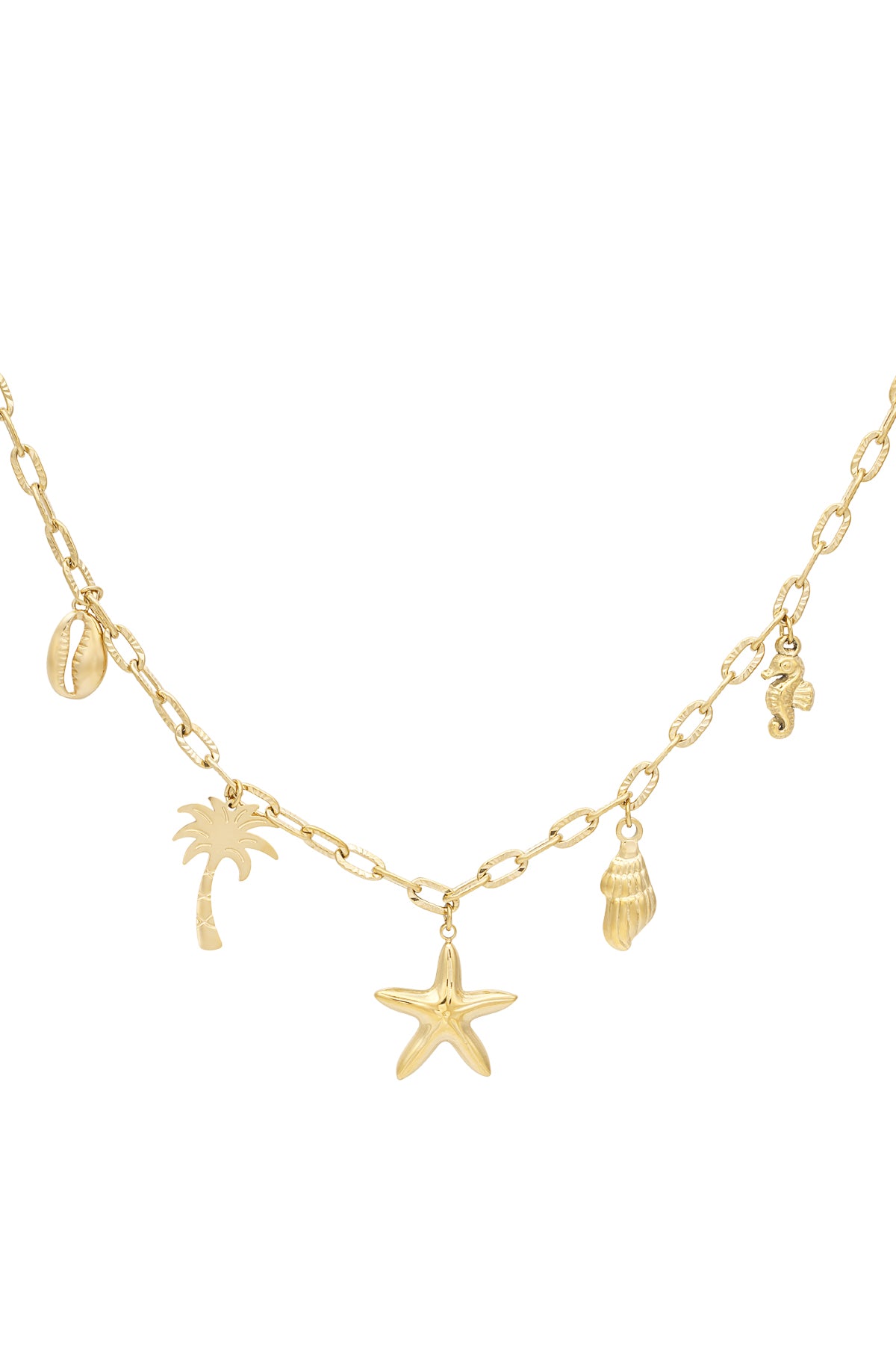 Close-up of gold charm necklace with seaside motifs including starfish, palm tree, shell, seahorse, and cowrie shell on medium-link chain