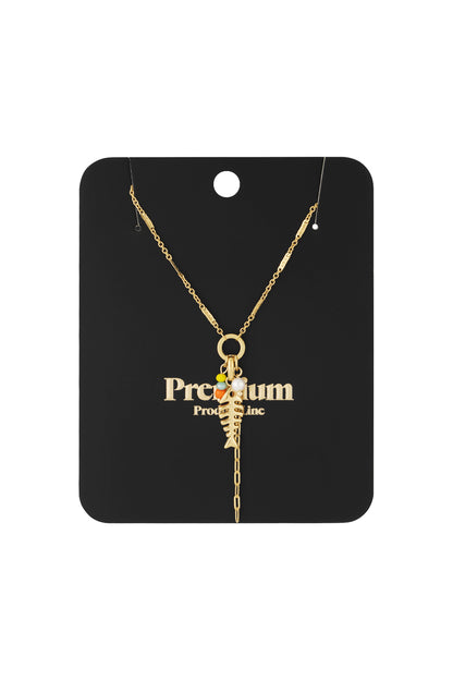 Gold fishbone necklace on black packaging card labelled Premium Product Line
