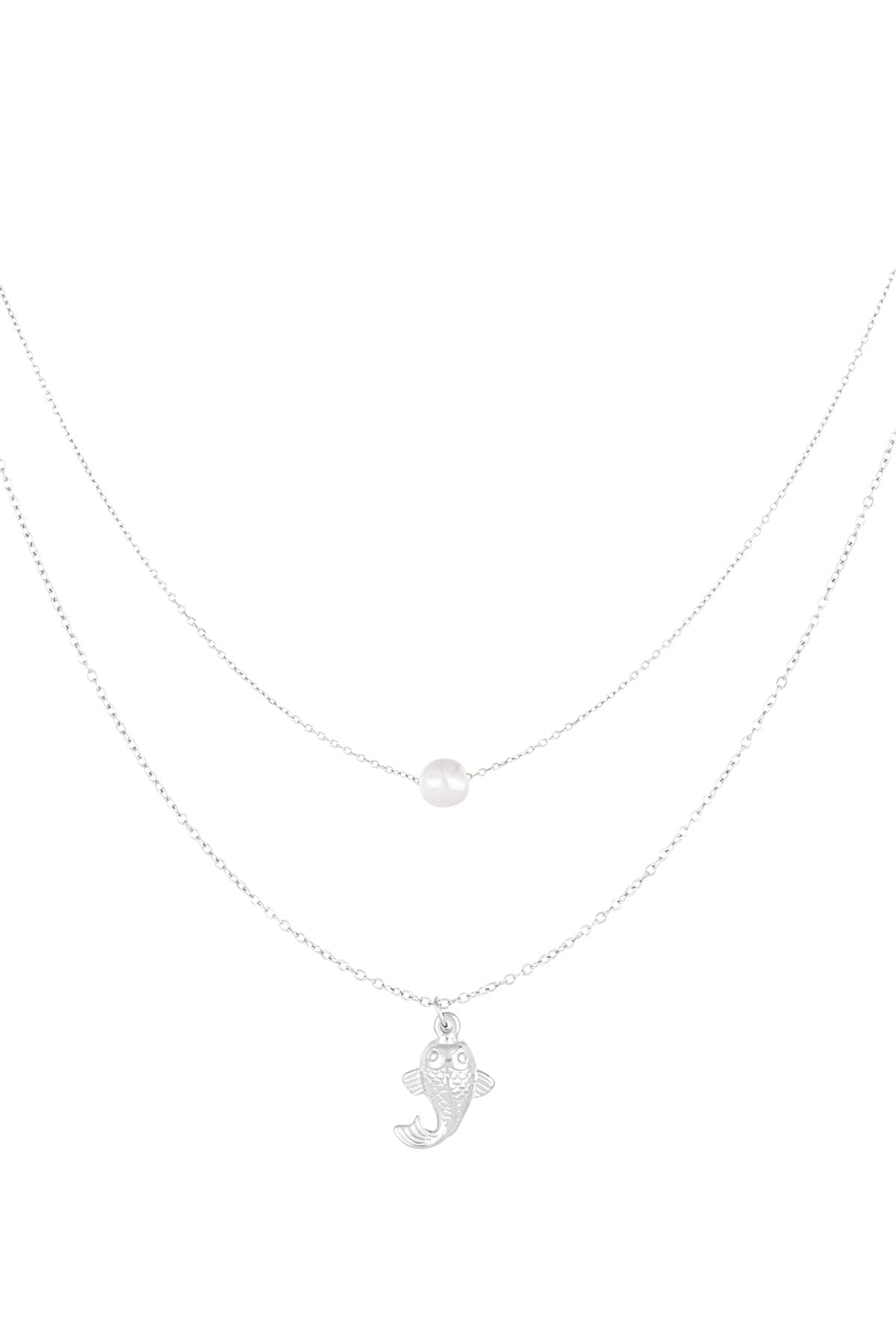 Silver layered necklace with a pearl and fish charm on white background