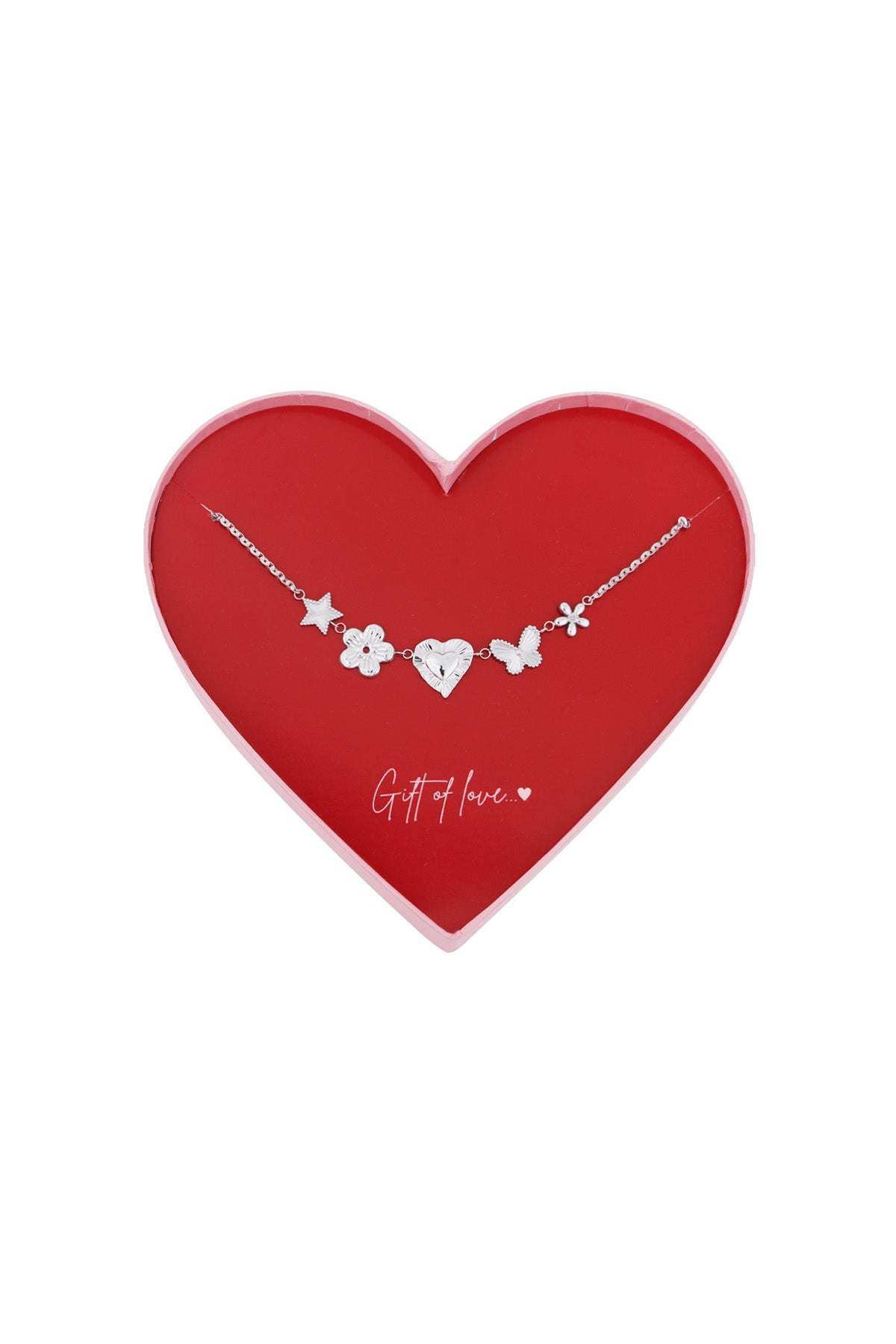 Silver charm pendant necklace with star, flower, heart, butterfly, and small flower charms displayed in a red heart-shaped gift box with pink edges