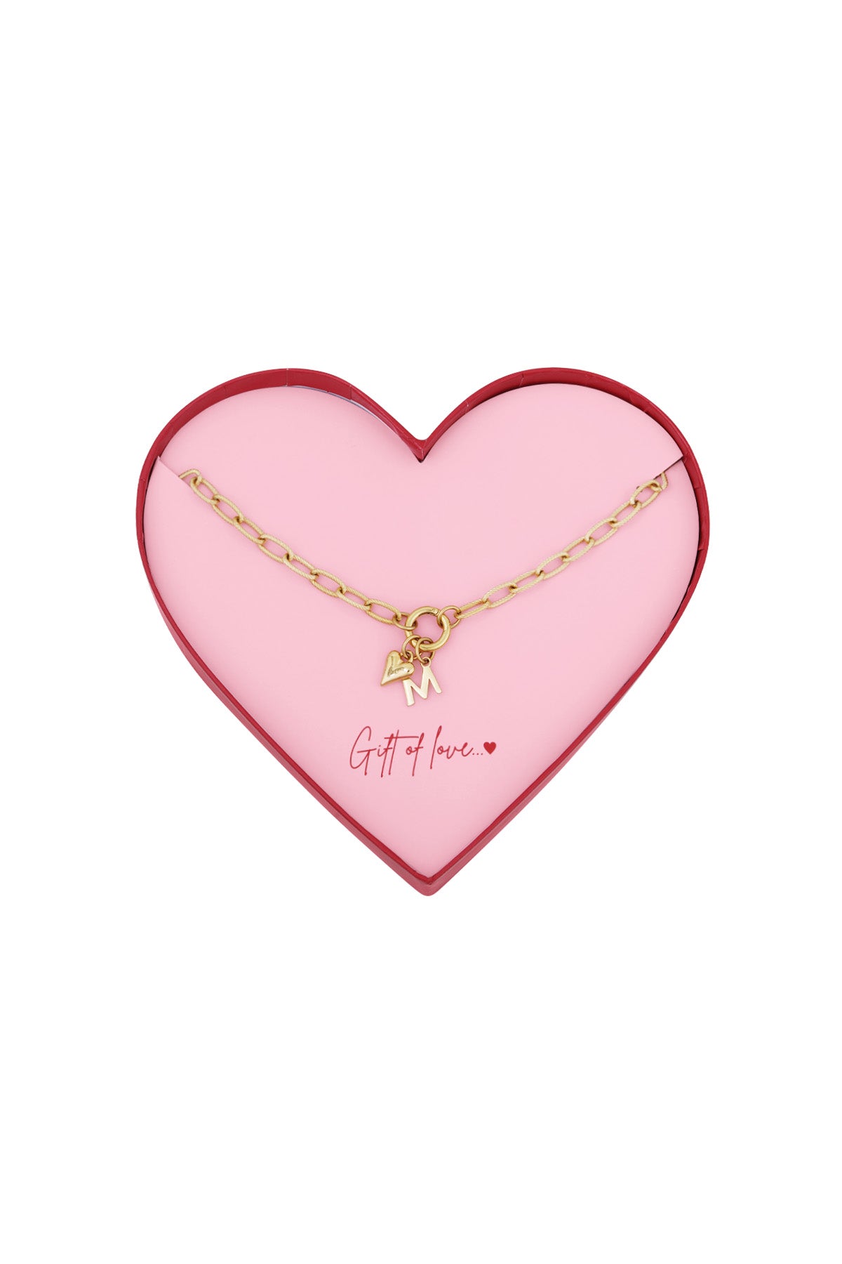 Gold-tone chunky link necklace with heart and letter M pendants presented in a pink heart-shaped box with ‘Gift of love’ inscription