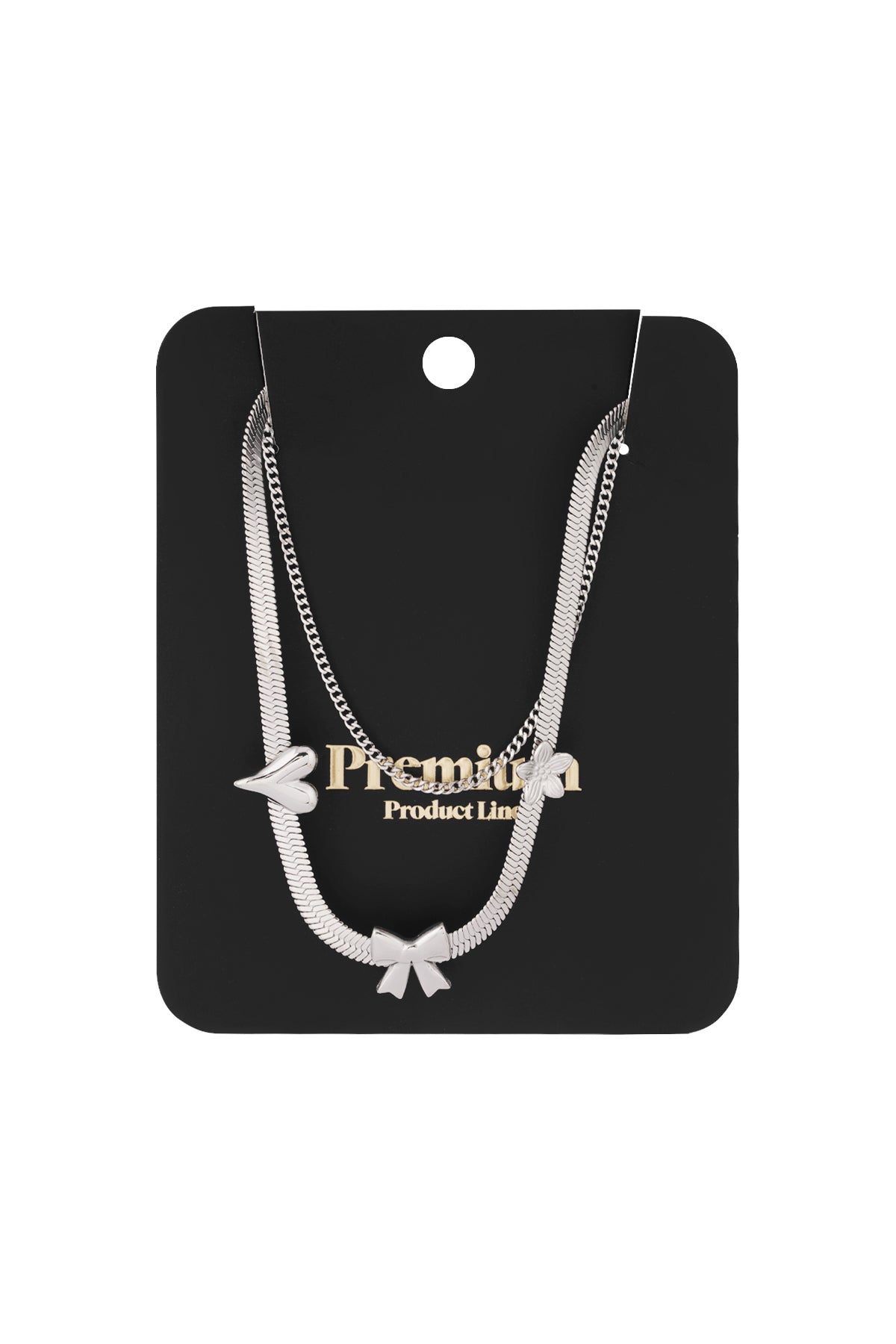 Silver layered charm necklace displayed on black premium product packaging card