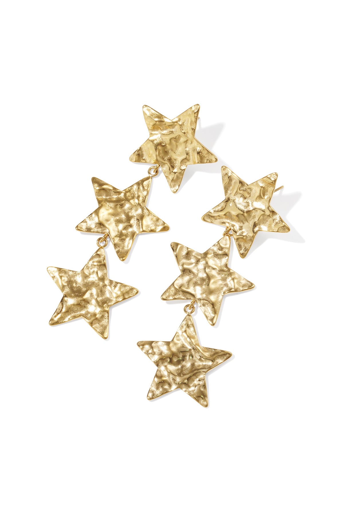 Hammered gold star dangle earrings featuring three textured stars linked together on a white background.