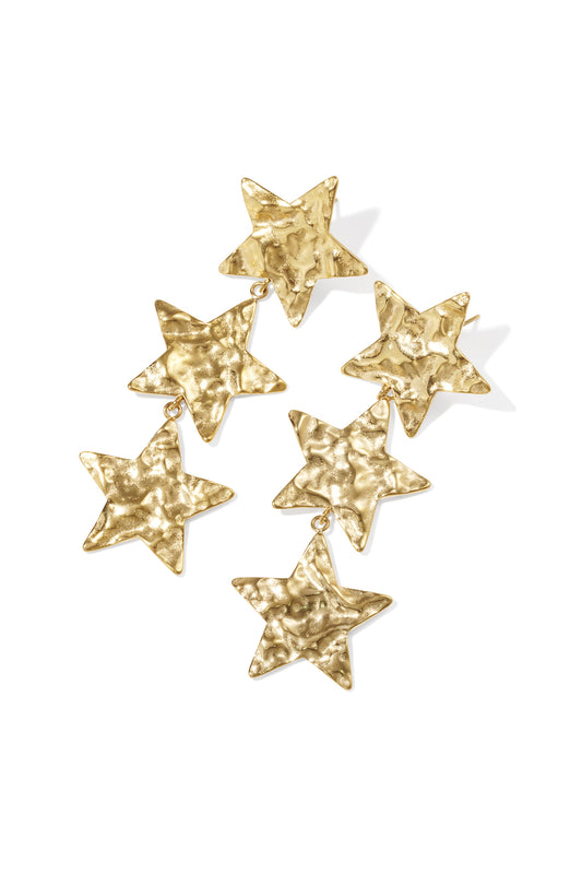 Hammered gold star dangle earrings featuring three textured stars linked together on a white background.