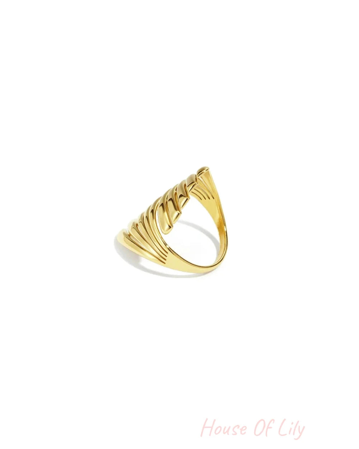 A polished gold ring featuring an asymmetrical, ribbed architectural design that tapers upward.