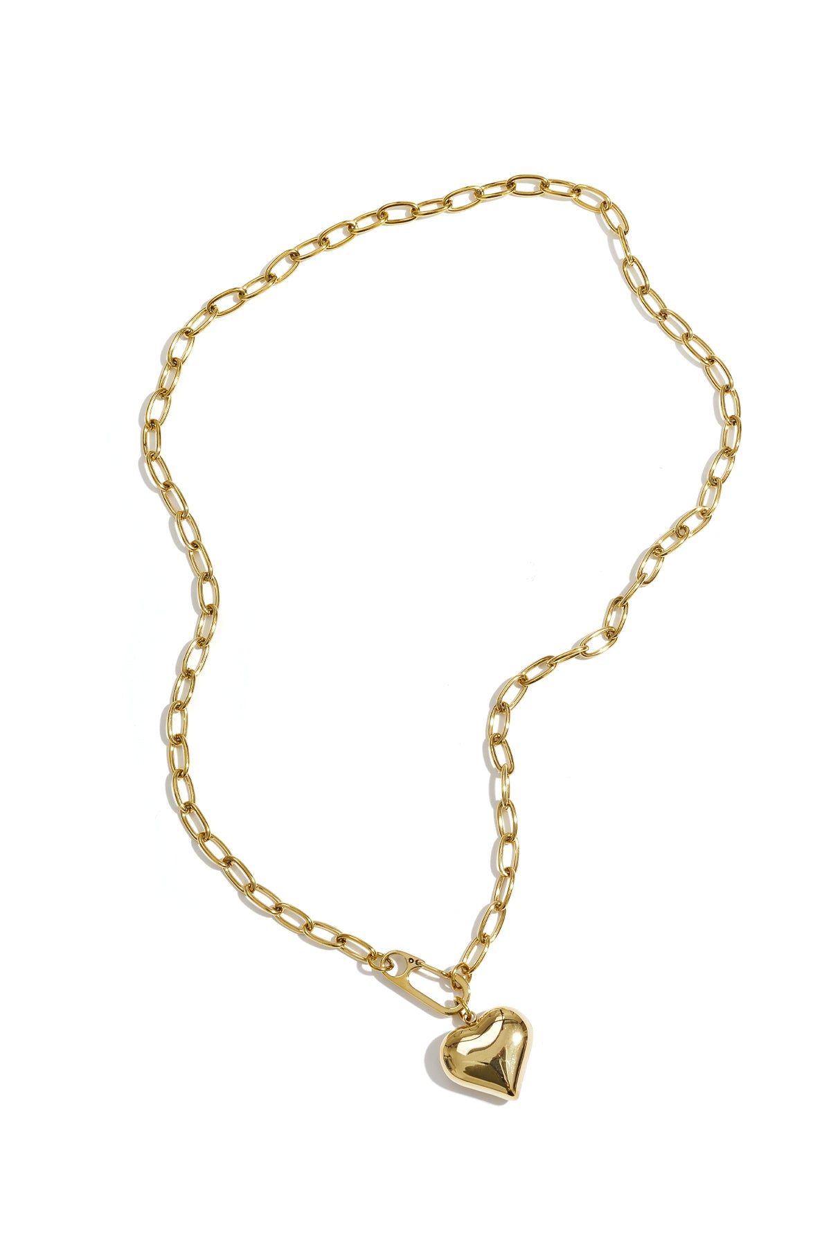 Gold chunky chain necklace with puff heart pendant laid out flat on white background