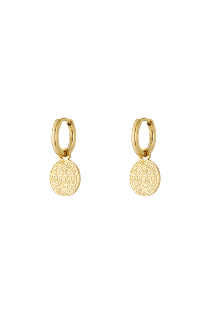 Pair of gold astro charm hoop earrings with engraved round pendants on a white background